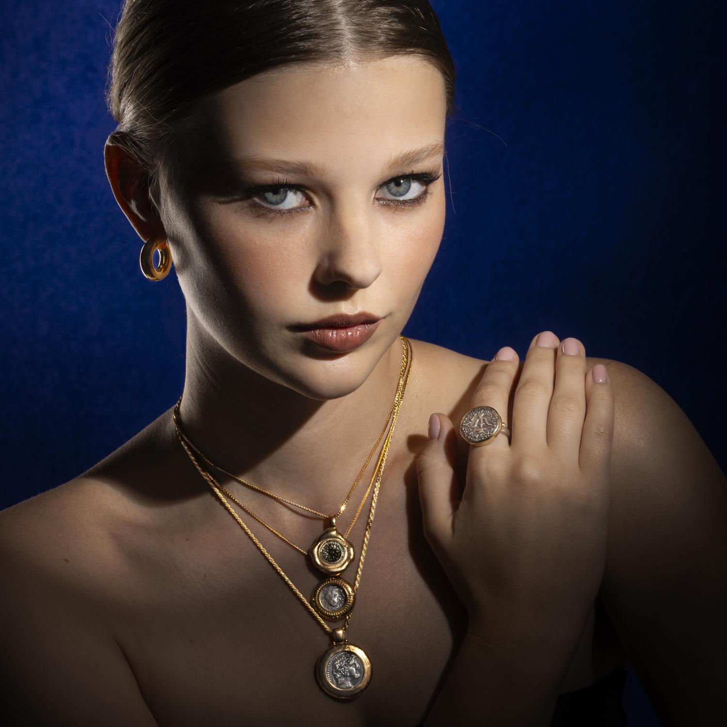 Widow's mite ancient coin set in A creative Dali style Gold frame