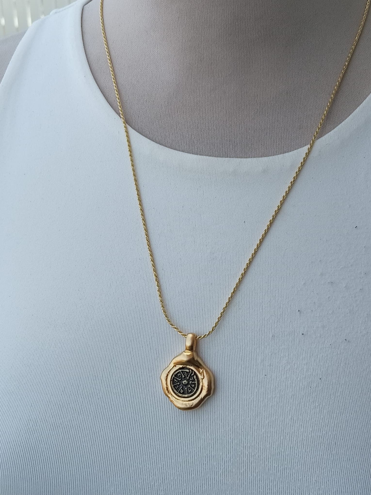 Widow's mite ancient coin set in A creative Dali style Gold frame