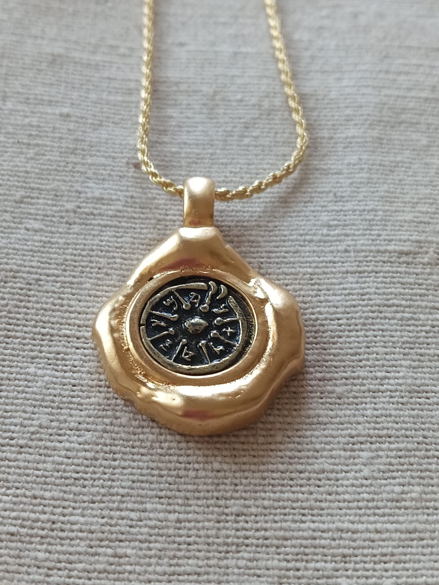 Widow's mite ancient coin set in A creative Dali style Gold frame